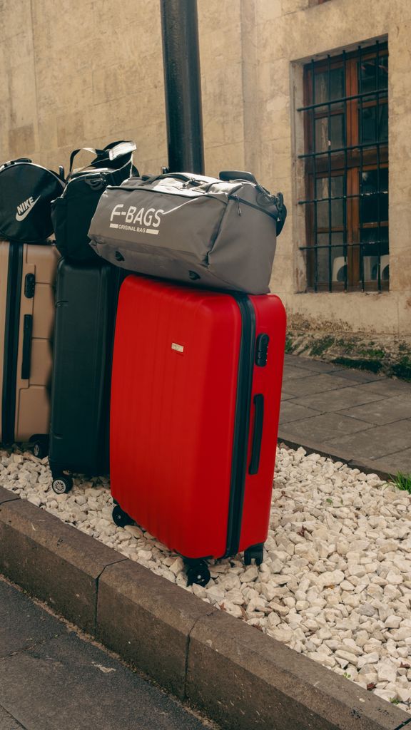 Vibrant luggage on Gaziantep street, capturing travel essence.